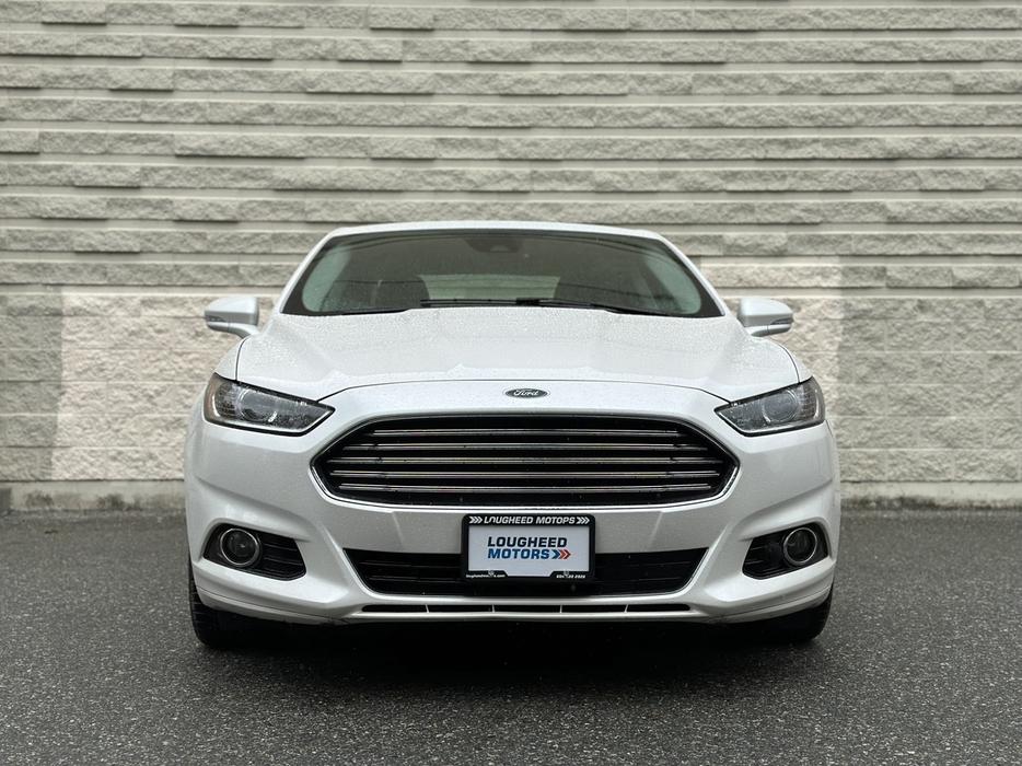 2015 Ford Fusion Hybrid display photo