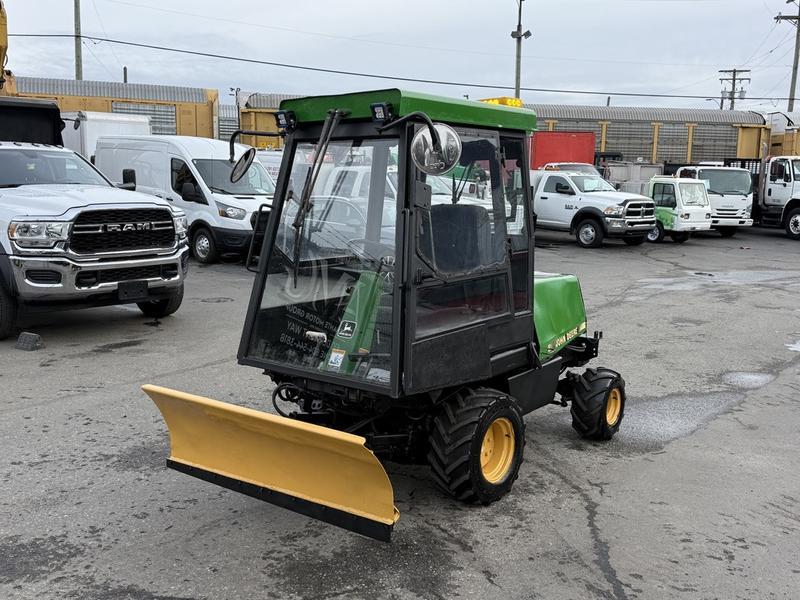1994 John Deere F1145 Front-mount Mower Tractor With Plow Attachment display photo