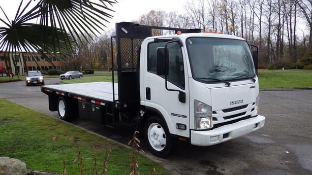 2017 Isuzu NPR 16 Foot Flat Deck Dually 3 Seater image 1