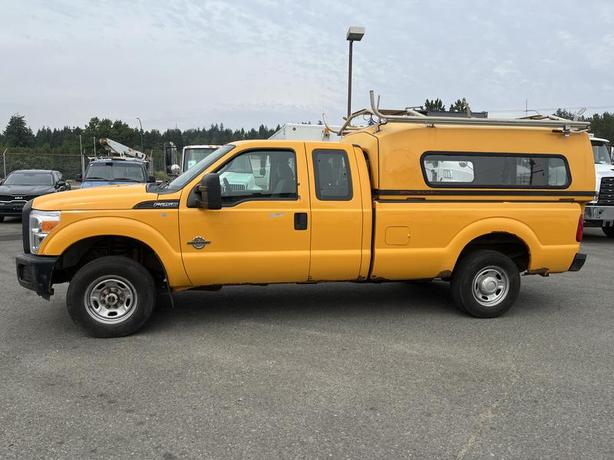 2013 Ford F-250 SD XLT SuperCab Long Bed 4WD Diesel with work top canopy image 2