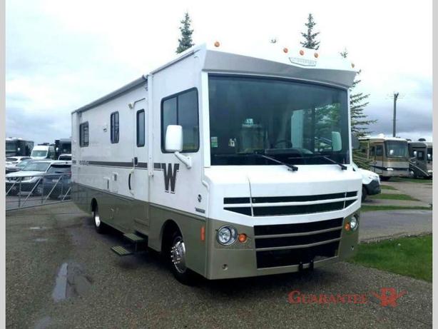 Used 2015 Winnebago Brave 27B image 1