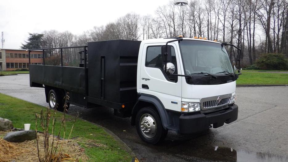 2009 International CF 600 City Star Side Dump Truck 3 Seater  Diesel display photo