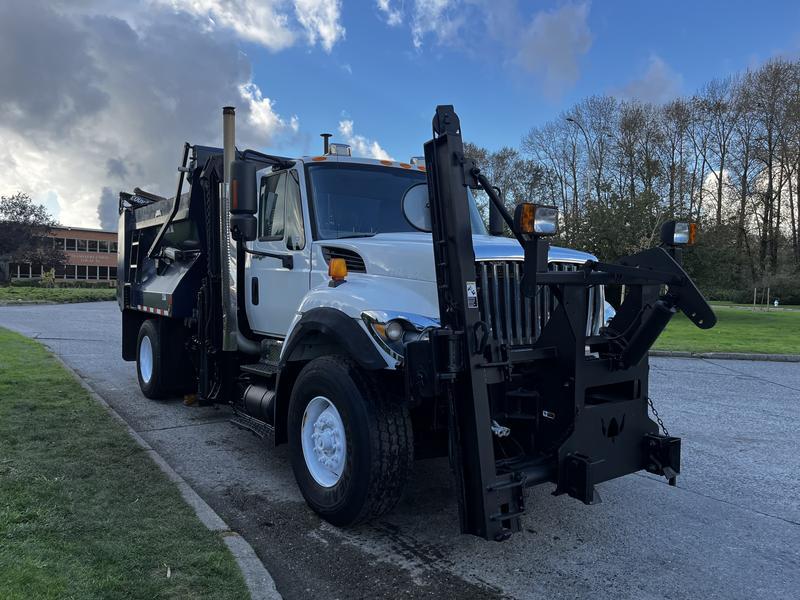 2011 International 7300 Dump Truck With Plow and Spreader Diesel display photo