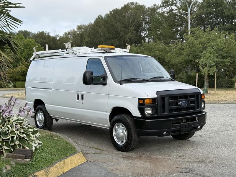 2013 Ford Econoline E-350 Super Duty Cargo Van with Shelving & Ladder Rack display photo