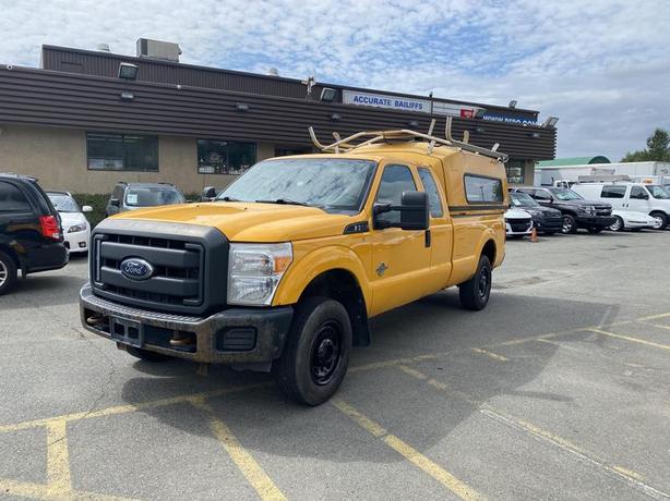 2013 Ford F-250 SD XLT SuperCab Long Bed 4WD Diesel with work top canopy image 1