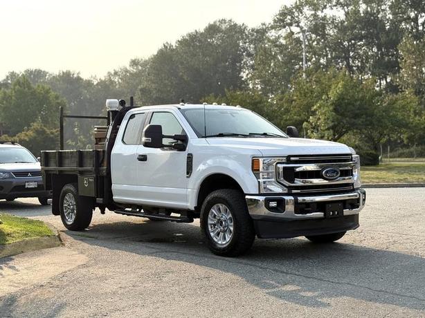 2021 Ford F-350 SD XLT 4X4 8-Foot Flat Deck Truck image 1