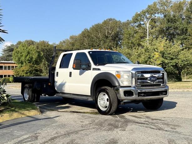 2014 Ford F-550 Super Duty 4x4 Crew Cab 11-Foot Flat Deck Truck image 1