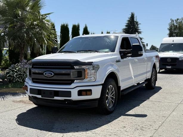 2018 Ford F-150 XLT SuperCrew 4x4 with Tonneau Cover & Headache Rack image 4