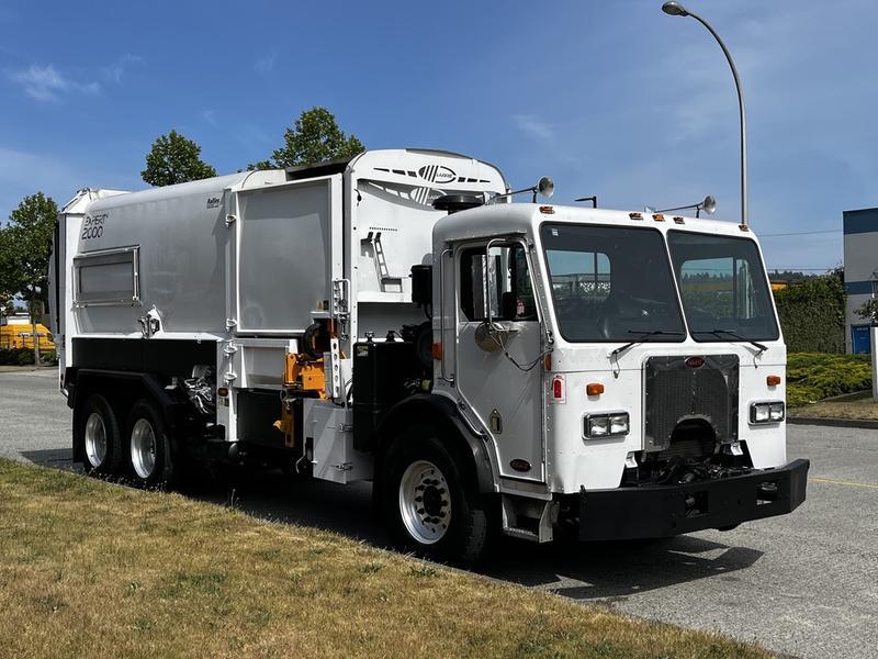 2010 Peterbilt 320 Expert 2000 Tandem Axle Garbage Truck Cummins Diesel with Air display photo