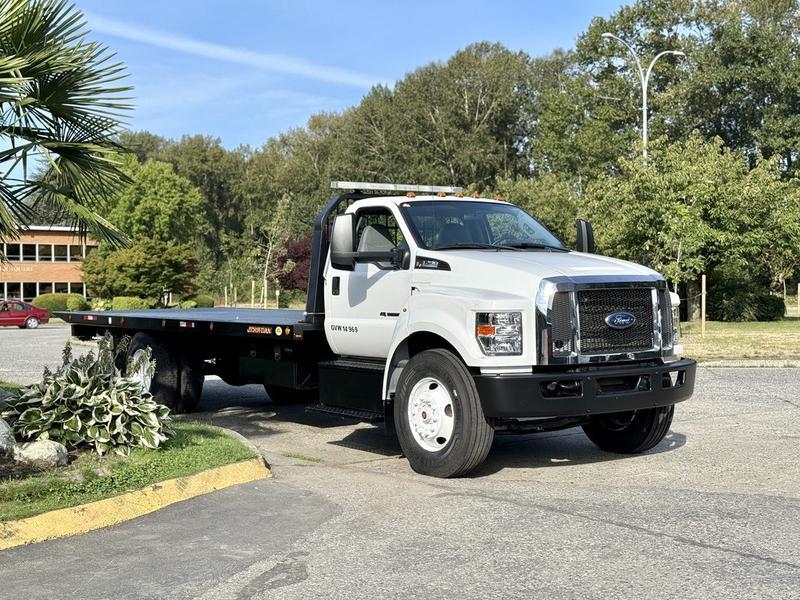 2018 Ford F-750 22-Foot Roll-Off Flat Deck Diesel Tow Truck with Wheel Lift display photo