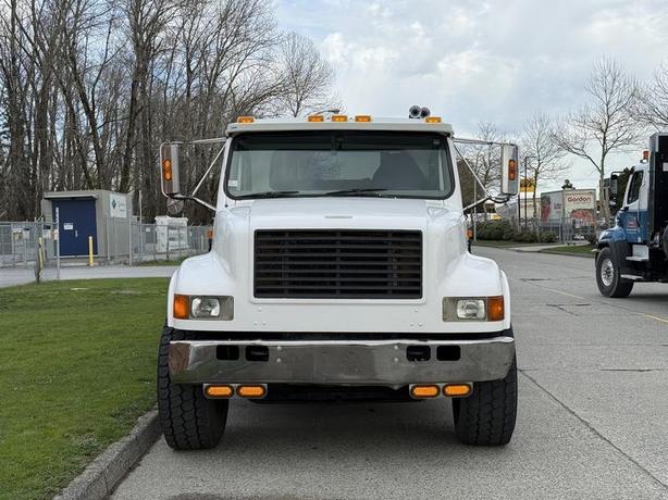 2000 International 4900 25 Foot Roll-Off Flat Deck Tow Truck Manual Diesel Air B image 3