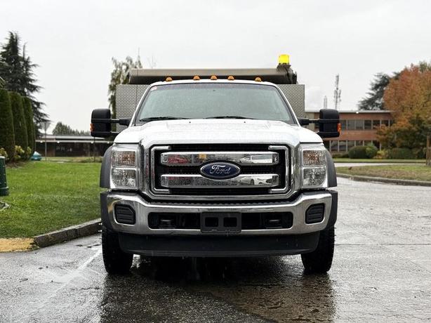 2015 Ford F-450 11-Foot Dump Truck with Storage Compartments and Beacon image 3