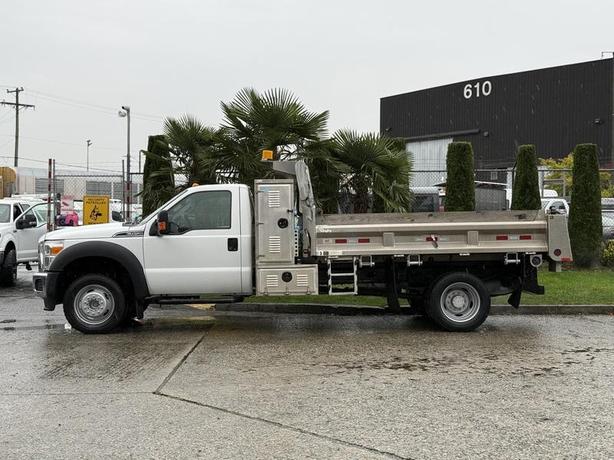 2015 Ford F-450 11-Foot Dump Truck with Storage Compartments and Beacon image 6