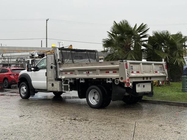 2015 Ford F-450 11-Foot Dump Truck with Storage Compartments and Beacon image 7