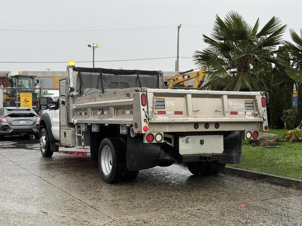 2015 Ford F-450 11-Foot Dump Truck with Storage Compartments and Beacon image 8