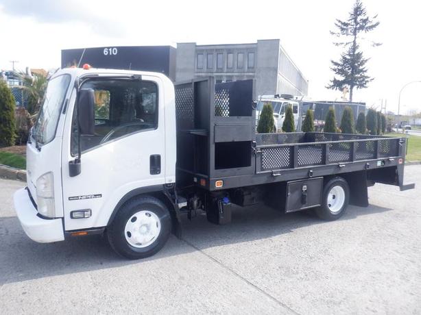 2015 Isuzu NPR 12 Foot  Flat Deck 3 Seater Diesel image 1