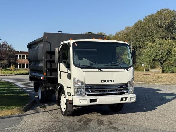 2017 Isuzu NPR HD 10-Foot Dump Truck with Storage Compartments image 2