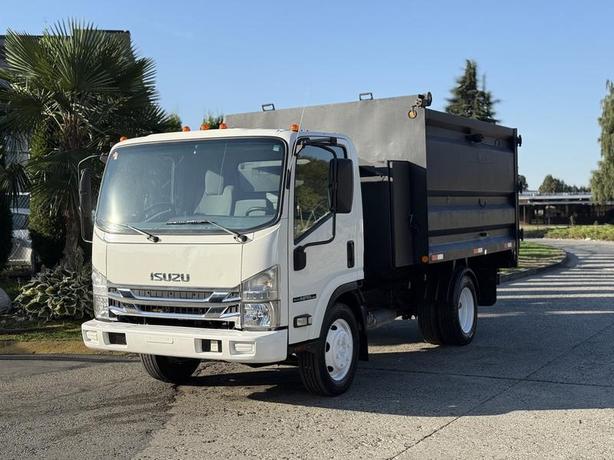 2017 Isuzu NPR HD 10-Foot Dump Truck with Storage Compartments image 4