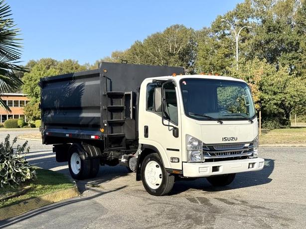 2017 Isuzu NPR HD 10-Foot Dump Truck with Storage Compartments image 1