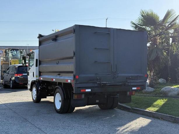 2017 Isuzu NPR HD 10-Foot Dump Truck with Storage Compartments image 8