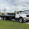 2000 International 4900 25 Foot Roll-Off Flat Deck Tow Truck Manual Diesel Air B thumbnail image