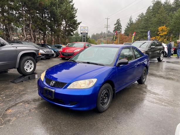 2004 Honda  Civic LX 5spd air works pw pl tilt cruise warranty image 1