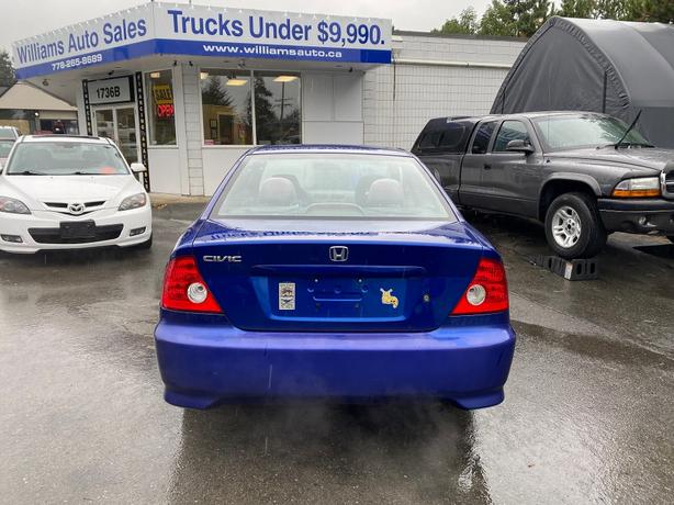 2004 Honda  Civic LX 5spd air works pw pl tilt cruise warranty image 6