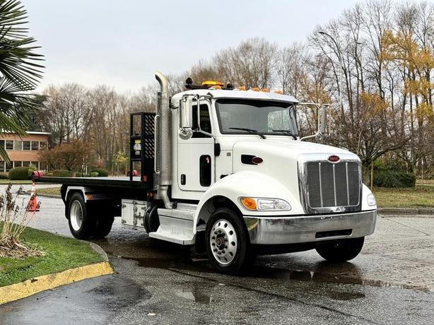 2020 Peterbilt 330 16-Foot Flat Deck Roll-Off Hook Truck image 1