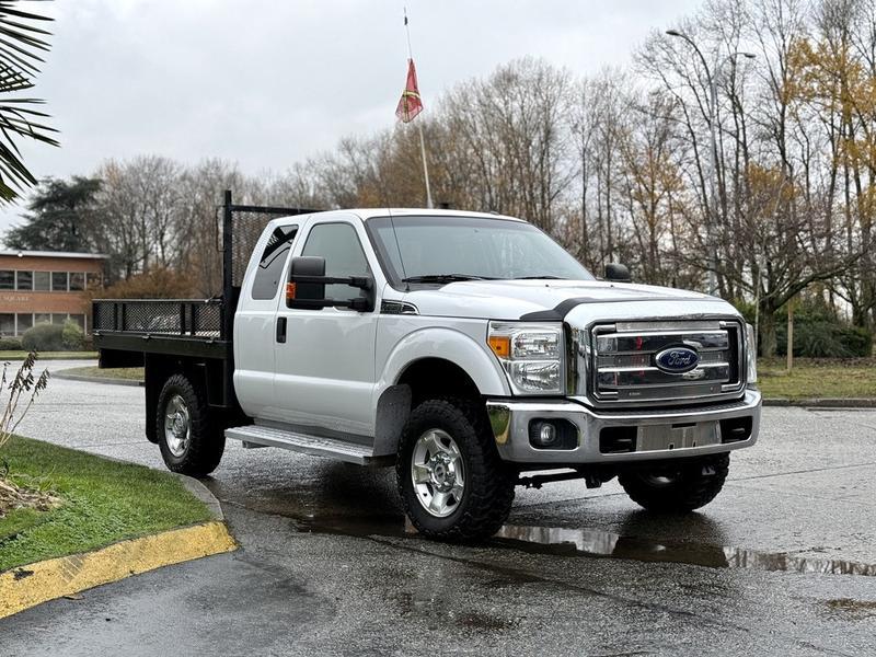 2016 Ford F-350 SD XLT SuperCab 4x4 9-Foot Flat Deck Truck display photo