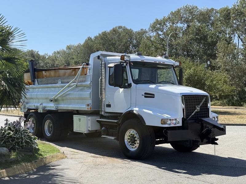 2005 Volvo VND 18-Speed Diesel Dump Truck with Sander and Plow display photo