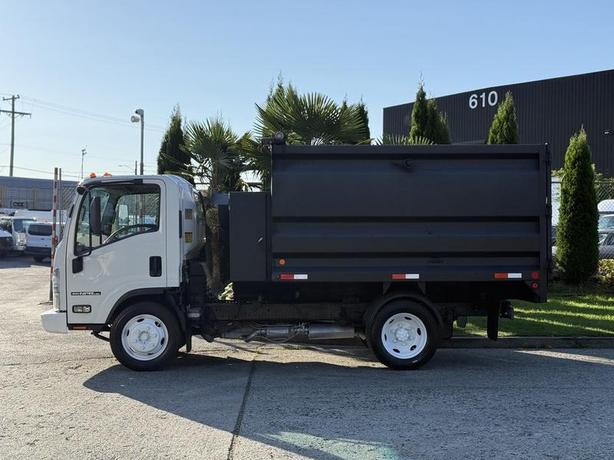 2017 Isuzu NPR HD 10-Foot Dump Truck with Storage Compartments image 6