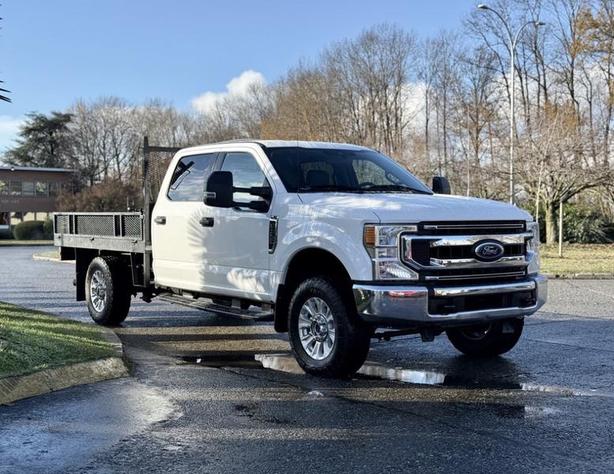 2020 Ford F-350 XLT 4X4 9-Foot Flat Deck Truck image 1
