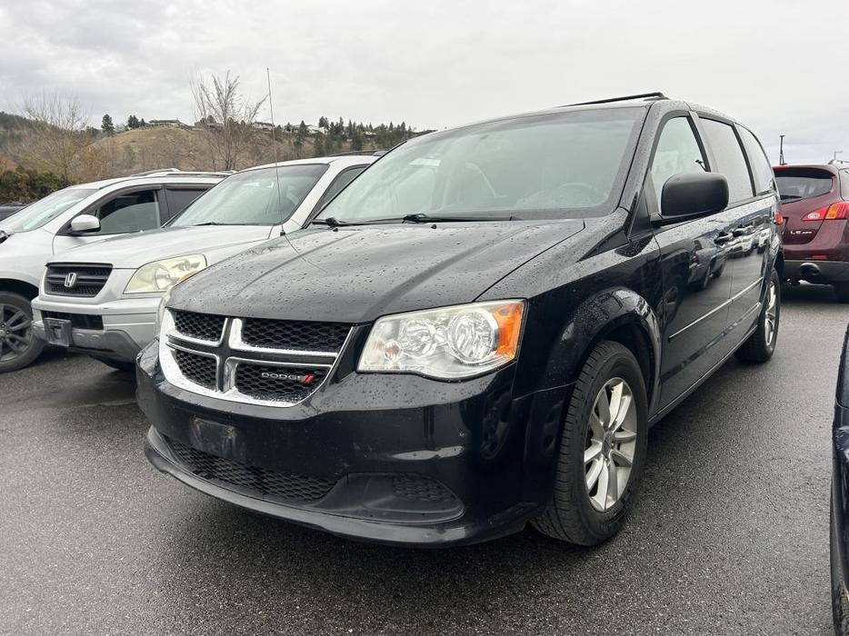 2013 Dodge Grand Caravan SXT AUTO, FWD, THREE ROWS, FM+AM RADIO, FABRIC SEATS, A display photo