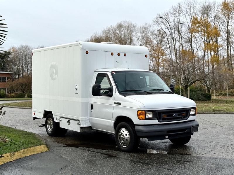 2007 Ford E-350 Super Duty Diesel 10-Foot Cube Van with Rear Work Shelves display photo