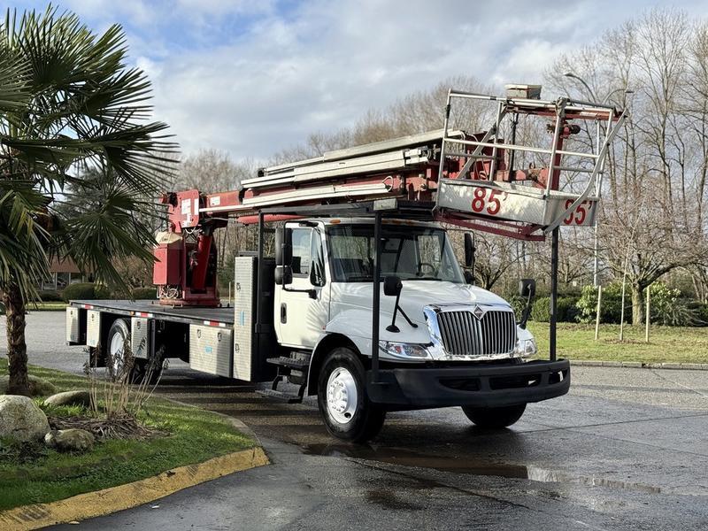 2010 International 4300 Durastar Bucket Flat Deck Truck Diesel display photo