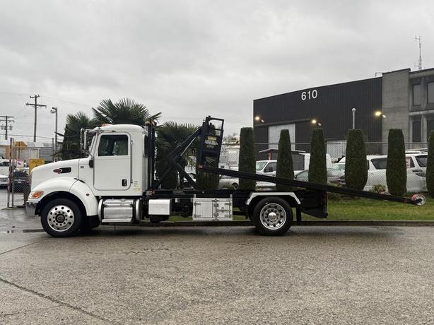 2020 Peterbilt 330 Hook Truck with 16-Foot Roll-Off Deck image 7