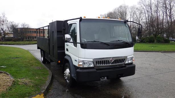 2009 International CF 600 City Star Side Dump Truck 3 Seater  Diesel image 2