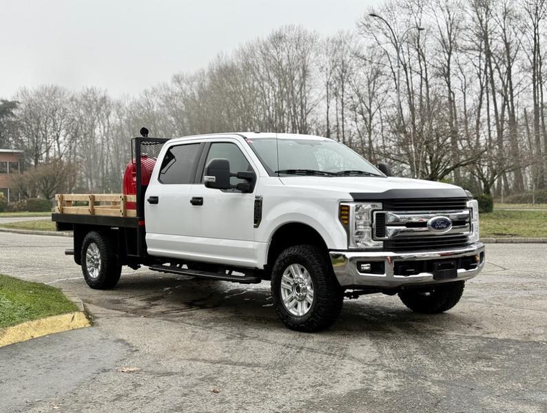 2019 Ford F-350 XLT Super Duty 4x4 Flat Deck Truck with Fuel Tank display photo