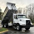 2009 Volvo VHD 6x4 Diesel Tandem Dump Truck with 16-Foot Box and 18-Speed thumbnail image