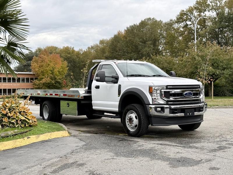 2022 Ford F600 XLT 4x4 Roll-Off Flat Deck Tow Truck display photo
