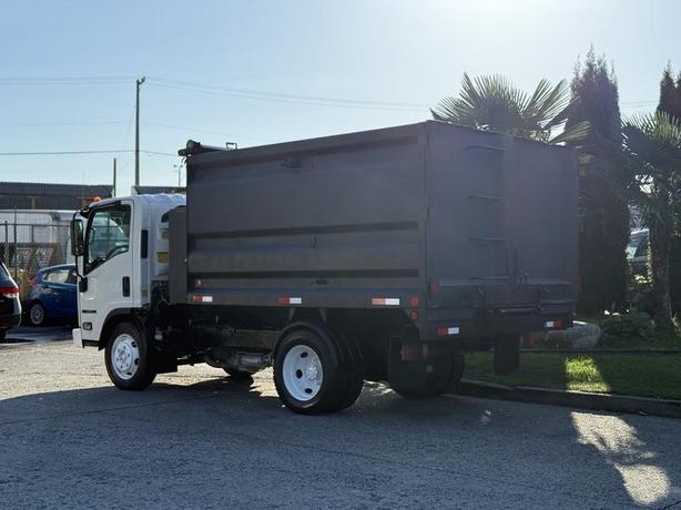 2017 Isuzu NPR HD 10-Foot Dump Truck with Storage Compartments image 7