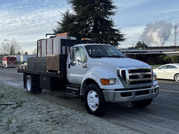 2011 Ford F-750 Flat Deck 3 Seater Diesel With Air Brakes and De-icing image 1