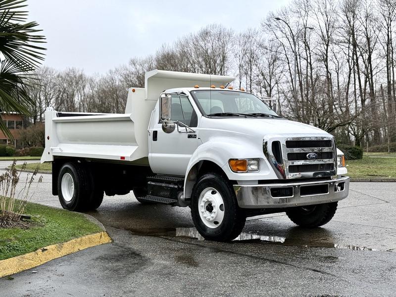 2011 Ford F-750 XL Super Duty Cummins 12-Foot Dump Truck with Air Brakes display photo