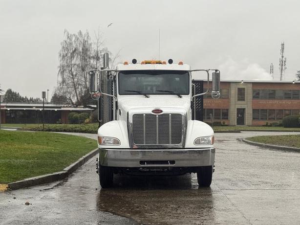 2020 Peterbilt 330 Hook Truck with 16-Foot Roll-Off Deck image 2