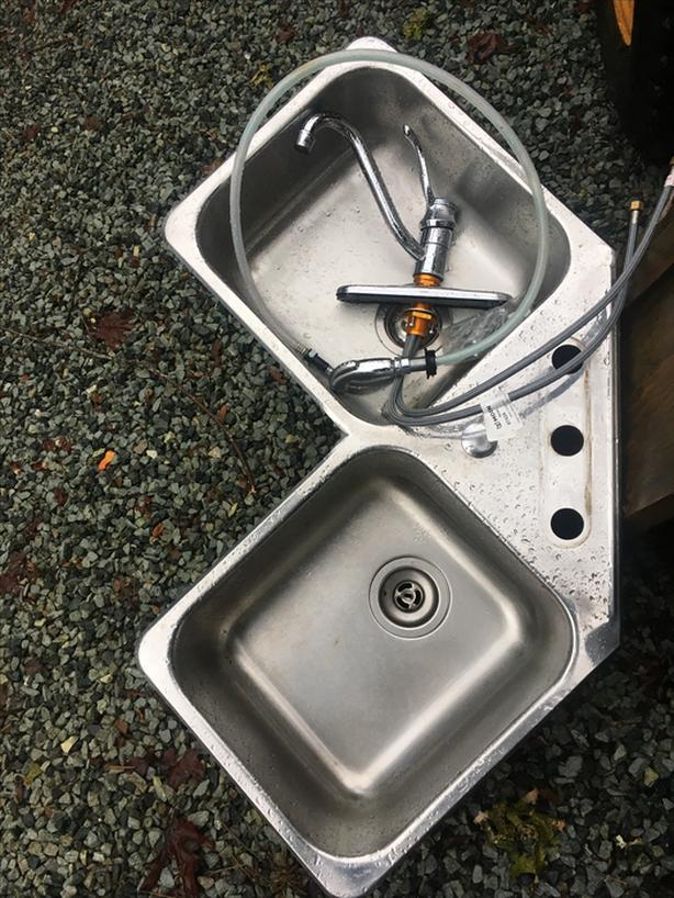 Stainless Steel Corner Sink with a New Faucet  and plumbing. image 4