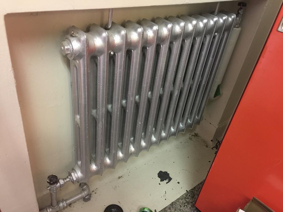 Various Sized Cast Iron Heaters with Valves and Bleeders display photo