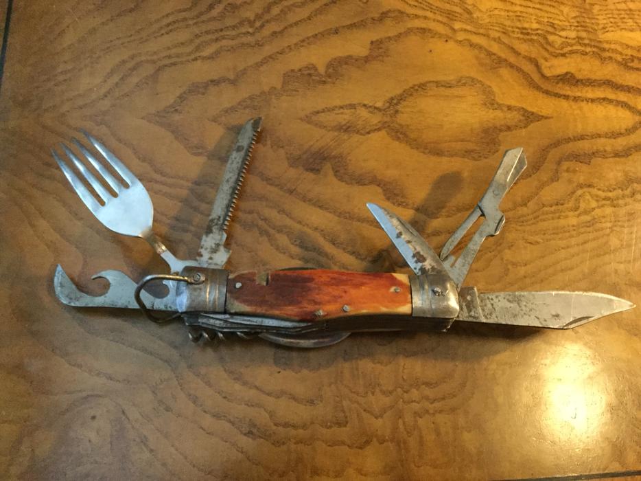 Antique bone handle traditional Swiss army knife display photo