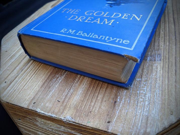 1915 copy of The Golden Dream by R. M. Ballantyne display photo