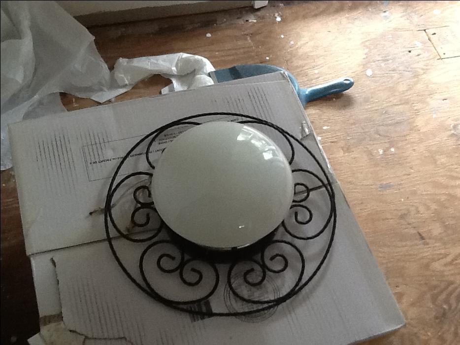 cool iron light fixture display photo