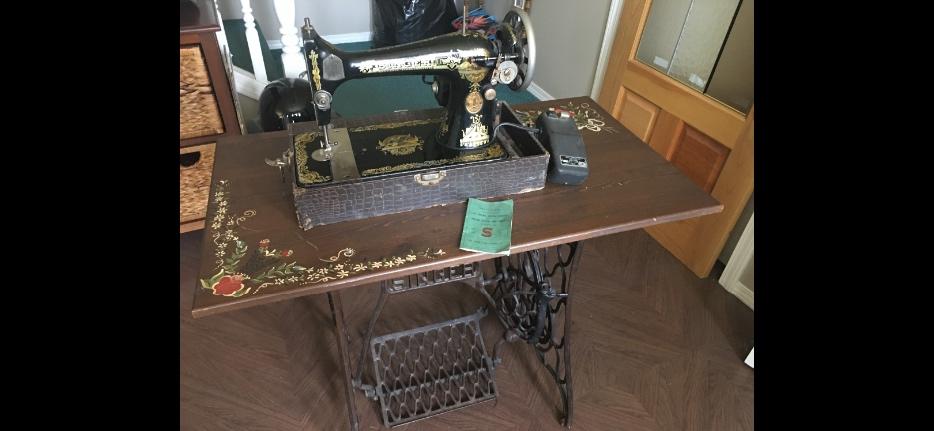 Vintage Singer sewing machine display photo